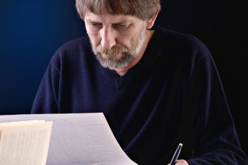 An older than traditional student conducts work.